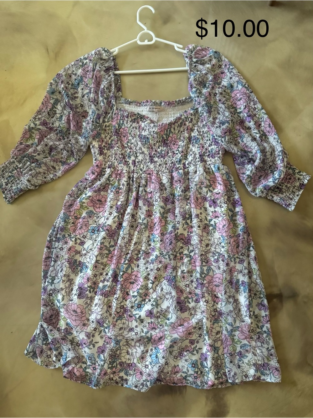 BCBGeneration women’s Floral Smocked Dress in Pink & Purple